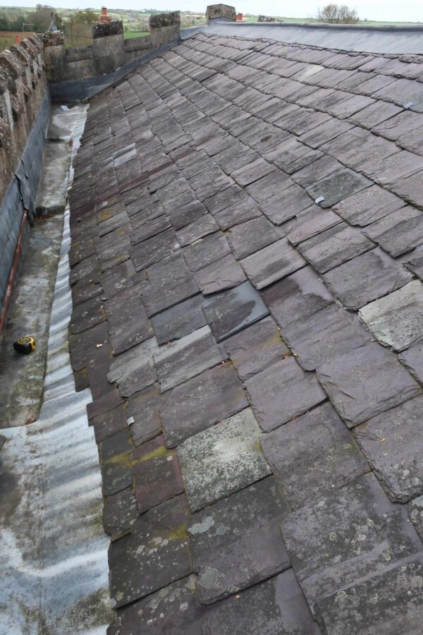 Slipped slate roof